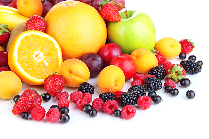 Fresh fruits and berries isolated on white